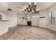 Living room with fireplace and chandelier at 6067 E Knolls S Way, Cave Creek, AZ 85331