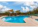 Community pool with shade umbrellas, lounge chairs, and spa at 6067 E Knolls S Way, Cave Creek, AZ 85331