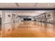 Large ballroom with hardwood floors, perfect for events at 6331 S Cypress Point Dr, Chandler, AZ 85249