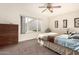 Bright bedroom with a comfortable bed and dresser at 6331 S Cypress Point Dr, Chandler, AZ 85249