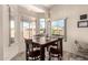 Bright breakfast nook with table and chairs, offering views of the backyard at 6331 S Cypress Point Dr, Chandler, AZ 85249