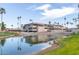 Community clubhouse with water views and palm trees at 6331 S Cypress Point Dr, Chandler, AZ 85249