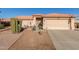 Single-story home with desert landscaping, two-car garage, and a welcoming front porch at 6331 S Cypress Point Dr, Chandler, AZ 85249