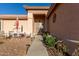 Front entry with walkway, landscaping and a seating area at 6331 S Cypress Point Dr, Chandler, AZ 85249