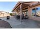 Covered patio with seating area and fire pit at 6331 S Cypress Point Dr, Chandler, AZ 85249