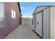 Backyard with storage shed and gravel ground at 7029 S 16Th Way, Phoenix, AZ 85042