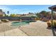 Enjoy this beautiful kidney shaped pool with patio at 7029 S 16Th Way, Phoenix, AZ 85042