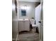 Bathroom with white vanity and gray tile floors at 7150 W Montecito Ave, Phoenix, AZ 85033