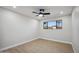 Well-lit bedroom with wood flooring and a modern ceiling fan at 7343 E Villa Way, Scottsdale, AZ 85257