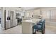 Modern kitchen with stainless steel appliances and white cabinets at 7365 E Adele Ct, Scottsdale, AZ 85255