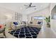 Spacious living room featuring a sectional sofa and large windows at 7365 E Adele Ct, Scottsdale, AZ 85255