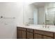 Modern bathroom with double vanity and large mirror at 7419 W Whitehorn Trl, Peoria, AZ 85383