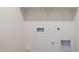 Convenient laundry area with hookups and shelving at 7419 W Whitehorn Trl, Peoria, AZ 85383