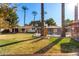 Large backyard with a sparkling pool and expansive grassy area at 7622 N 7Th Ave, Phoenix, AZ 85021