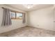 Bedroom with tile floors and window with curtains at 7622 N 7Th Ave, Phoenix, AZ 85021