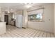 Kitchen with ample counter space and white cabinetry at 7622 N 7Th Ave, Phoenix, AZ 85021