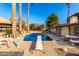 Inviting swimming pool with diving board in backyard at 7622 N 7Th Ave, Phoenix, AZ 85021