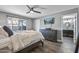 Spacious bedroom featuring a ceiling fan and hardwood flooring at 7743 E Roosevelt St, Scottsdale, AZ 85257