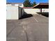 Parking area with assigned carport and storage unit at 7828 N 47Th Ave, Glendale, AZ 85301