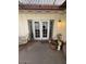 View of patio doors leading to a covered patio at 7828 N 47Th Ave, Glendale, AZ 85301