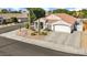 Single-story home with desert landscaping and two-car garage at 7908 W Rose Garden Ln, Peoria, AZ 85382