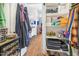 Well-organized linen closet with shelves for storage at 7908 W Rose Garden Ln, Peoria, AZ 85382