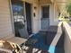 Small balcony with table and chairs at 8210 E Garfield St # K213, Scottsdale, AZ 85257