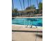 Inviting community pool with shaded seating area at 8210 E Garfield St # K213, Scottsdale, AZ 85257