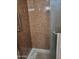 Shower stall with marble wall and built-in shelves at 8210 E Garfield St # K213, Scottsdale, AZ 85257