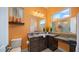 Bathroom with corner vanity, granite countertop, and a toilet at 8519 E Regina Cir, Mesa, AZ 85207