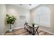 Home office features a desk and large window with plantation shutters at 8519 E Regina Cir, Mesa, AZ 85207