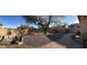 Spacious backyard with patio furniture and gravel landscaping at 9219 S 185Th Ave, Goodyear, AZ 85338