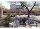 Relaxing backyard oasis with patio furniture and desert landscaping at 9219 S 185Th Ave, Goodyear, AZ 85338