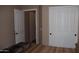 Bedroom with built-in closet and extra door at 9219 S 185Th Ave, Goodyear, AZ 85338