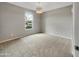 Cozy bedroom with neutral walls and carpet flooring at 10211 E Wavelength Ave, Mesa, AZ 85212