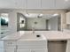 Kitchen island with farmhouse sink and stainless steel dishwasher at 10211 E Wavelength Ave, Mesa, AZ 85212