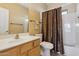 Bathroom with tub shower combo and wood vanity at 11022 N Indigo Dr # 121, Fountain Hills, AZ 85268