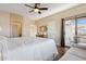 Main bedroom with private balcony access and en-suite bathroom at 11022 N Indigo Dr # 121, Fountain Hills, AZ 85268