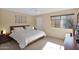 Spacious bedroom with a king-size bed and ample natural light at 11333 N 92Nd St # 2061, Scottsdale, AZ 85260