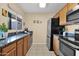 Modern kitchen with stainless steel appliances and granite countertops at 11333 N 92Nd St # 2061, Scottsdale, AZ 85260