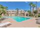 Community pool with lounge chairs and hot tub at 11333 N 92Nd St # 2061, Scottsdale, AZ 85260