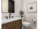 Modern bathroom with marble vanity and toilet at 12059 N Luckenbach St, Surprise, AZ 85388