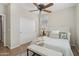 Guest bedroom with bench at foot of bed at 12952 W Eagle Ridge Ln, Peoria, AZ 85383