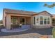 Home exterior with covered patio and landscaping at 12952 W Eagle Ridge Ln, Peoria, AZ 85383