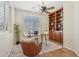 Home office with built-in shelving and wood desk at 12952 W Eagle Ridge Ln, Peoria, AZ 85383