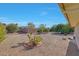 Landscaped backyard with gravel and desert plants at 13226 W Mesa Verde Dr, Sun City West, AZ 85375