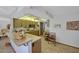 Galley kitchen with ample counter space and wood cabinets at 13226 W Mesa Verde Dr, Sun City West, AZ 85375