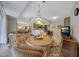 Kitchen features a breakfast bar and opens to the living and dining areas at 13226 W Mesa Verde Dr, Sun City West, AZ 85375