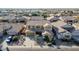 Two-story house with a large driveway and desert landscaping at 13611 W Merrell St, Avondale, AZ 85392