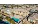 Aerial view of two-story house with pool and surrounding homes at 13611 W Merrell St, Avondale, AZ 85392